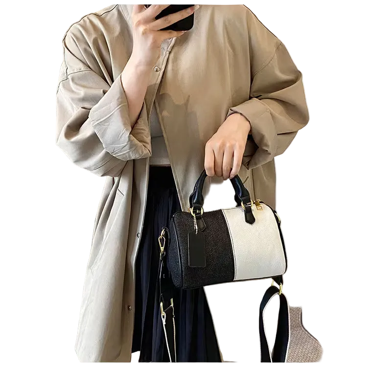 Small square bag features a two-tone retro style